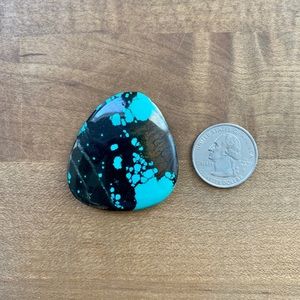 Turquoise Cabochon set in Leather Service